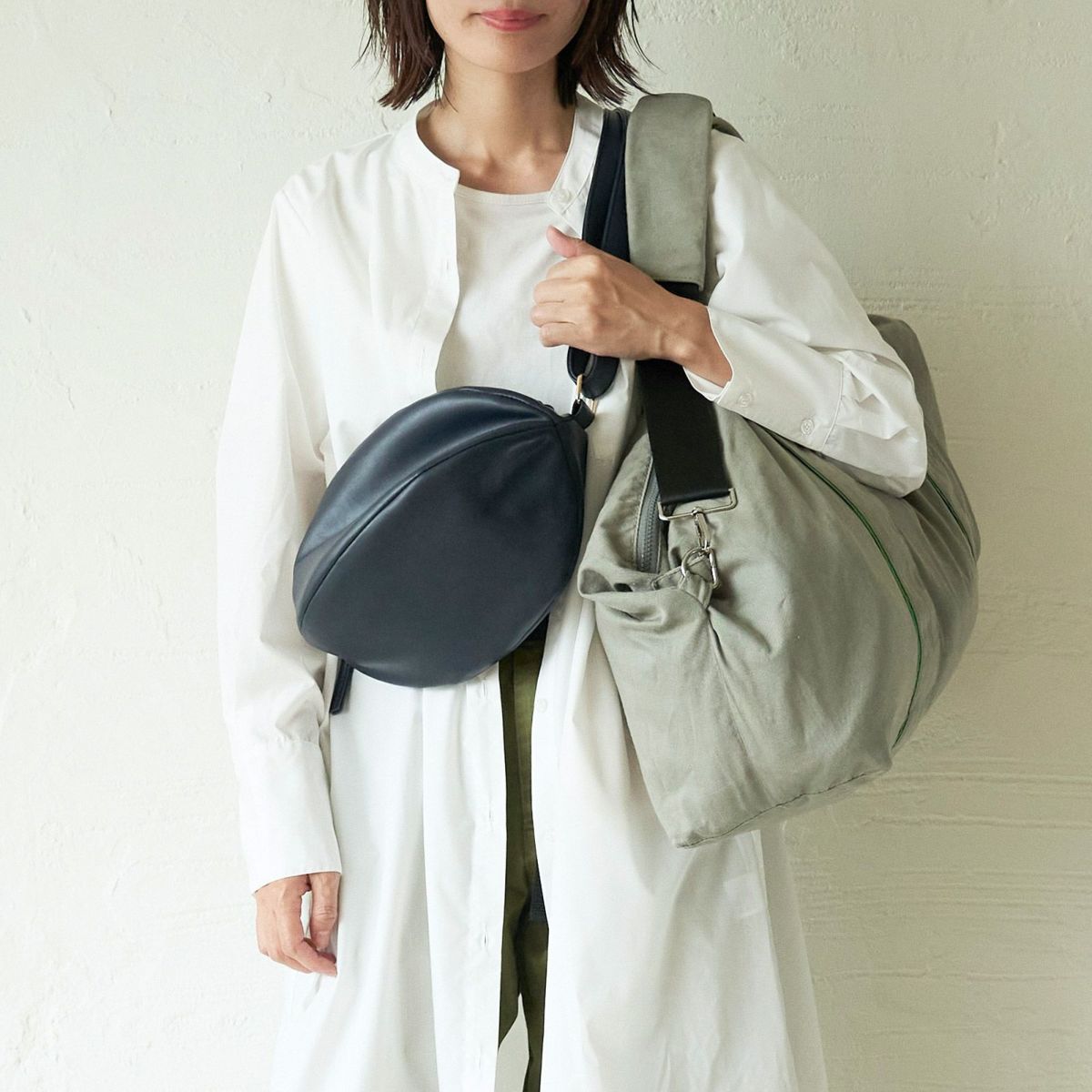 旅行中のスマホ財布収納に便利なポーチとボストンバッグ